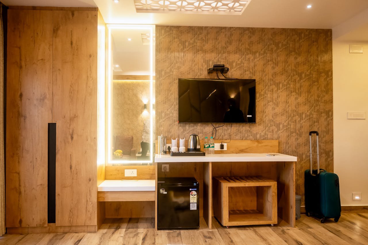 Elegantly designed hotel room with modern amenities and minimalist decor.